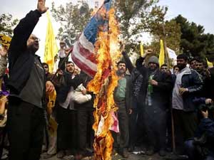 Iranians burn the American flag in 1980