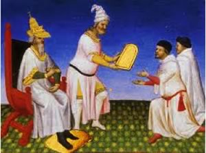 Kublai Khan presents the Polos with a golden tablet.