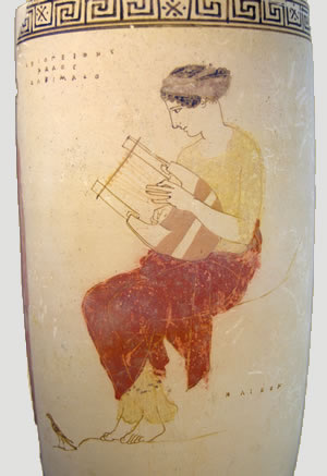 A Greek vase depicting a woman playing the lyre.